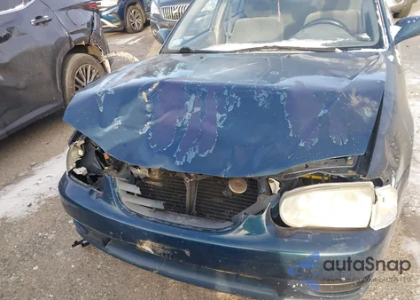 2002 Toyota Corolla Le z USA, uszkodzony, nr VIN 2T1BR12E72C581972